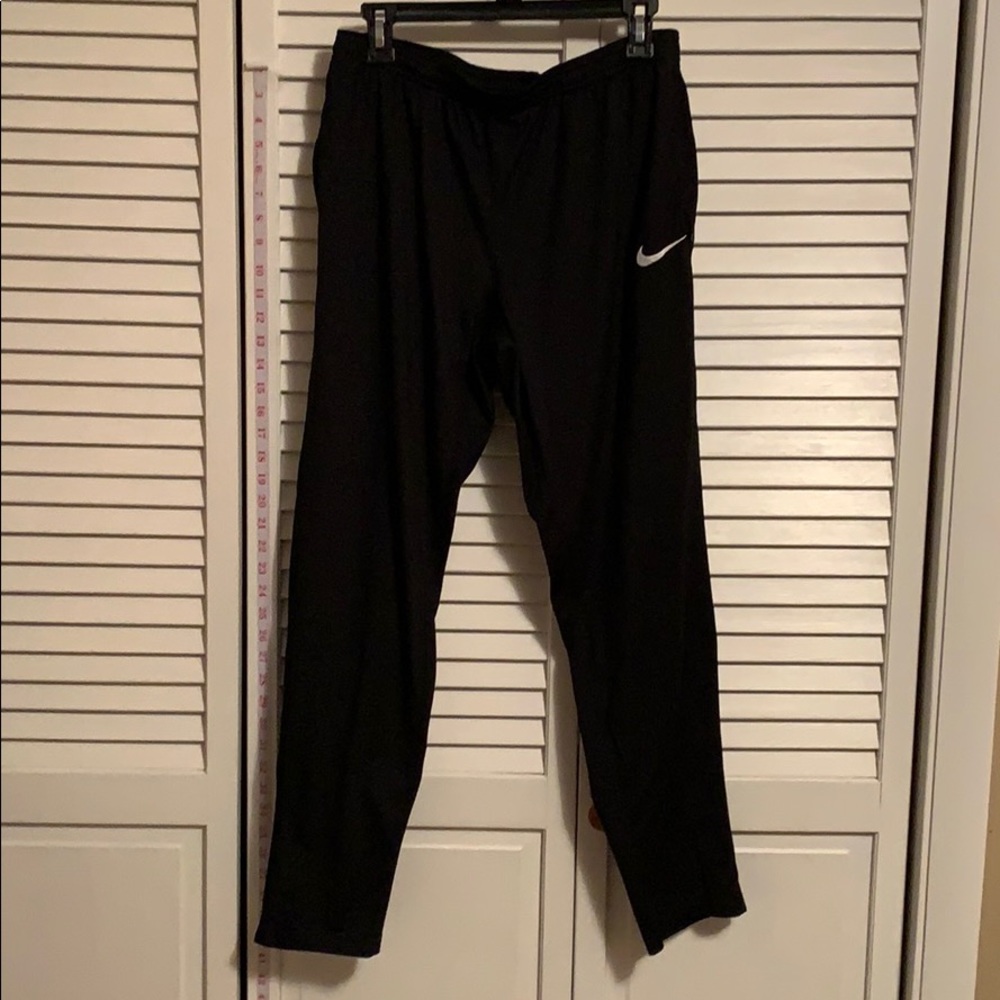 Nike Dri Fit soccer pants black L zipper pocket